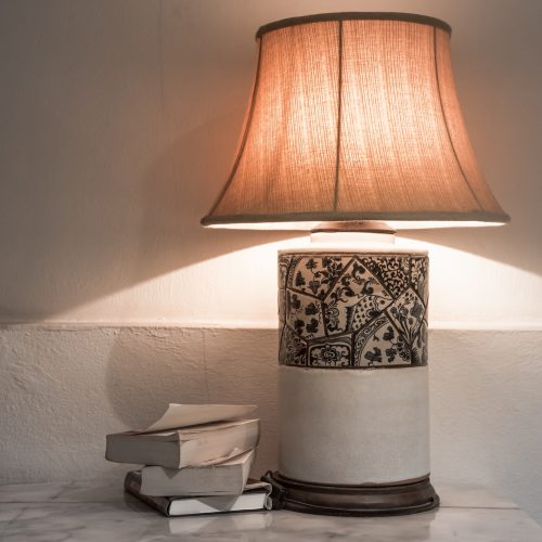 lamp with books on the table